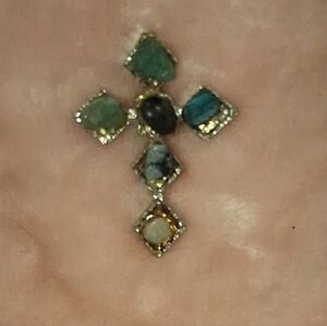 Elegant Gold and Green Cross Pendant